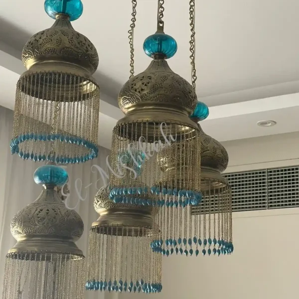 نجف مودرن نحاس كريستال بتصميم انسيابي راقي من المشكاة 