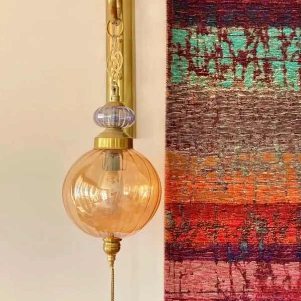 أبليك نحاسي كريستال للحوائط بتصميم انسيابي وتفاصيل ملكية من المشكاة 